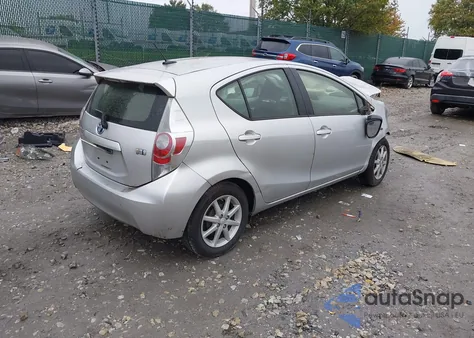 2014 Toyota Prius C Four from USA, damaged, VIN JTDKDTB34E1078028